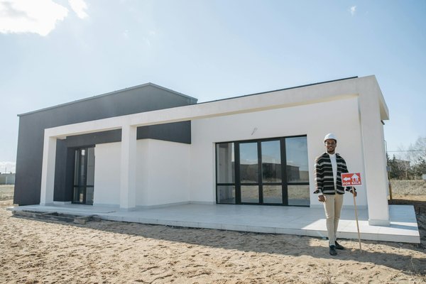 Wat zijn de beste manieren om een lening te onderhandelen voor mijn vastgoedproject?